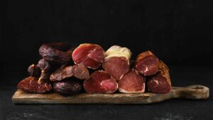 Guía visual paso a paso para preparar un asado perfecto con carnes premium, ideal para compartir en nuestro blog de carnes.